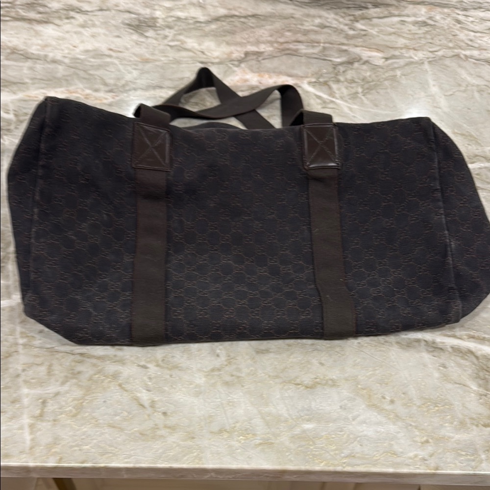 Black Duffel Bag with Spacious Design and Elegant Texture